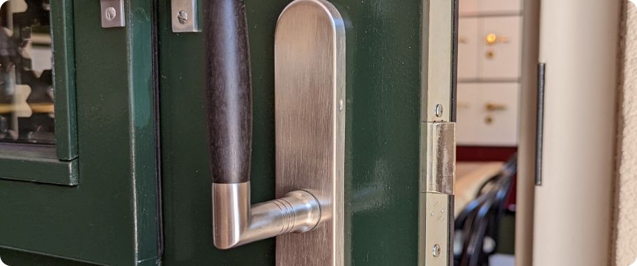 Sfeerafbeelding deurklink omhoog